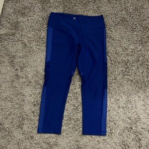 90 degree by reflex leggings with mesh on sides of legs.